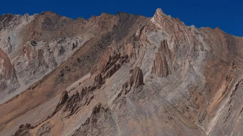 Sharp Folded Rocks on Mountain Slope Drone view Stock Footage 311351324