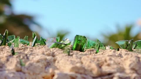 Sharp Glass Shards Embedded in a Stone Wall - Protective Barrier in a Sunny Day Stock Footage 301742079