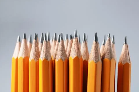 Sharp graphite pencils on grey background, closeup Foto stock