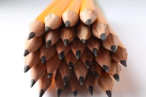 Sharp graphite pencils on light background, closeup Stock Photos