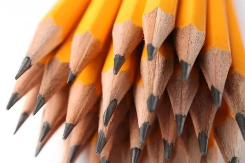Sharp graphite pencils on light background, closeup Stock Photos