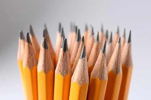 Sharp graphite pencils on light grey background, closeup Stock Photos