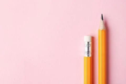 Sharp graphite pencils on pink background, top view. Space for text 写真素材