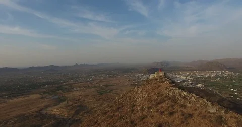 Sharp Hill Crest with Vast Valley Below Stock Footage 80953412