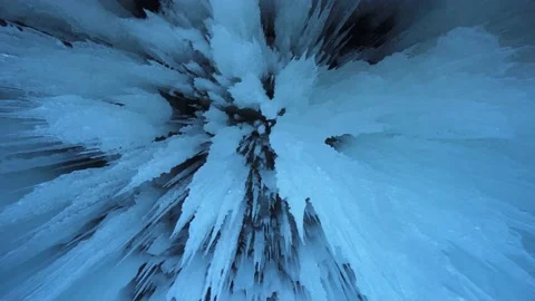Sharp ice floes hang overhead icicles winter frozen cave lake Baikal Nature best Stock Footage 165663724