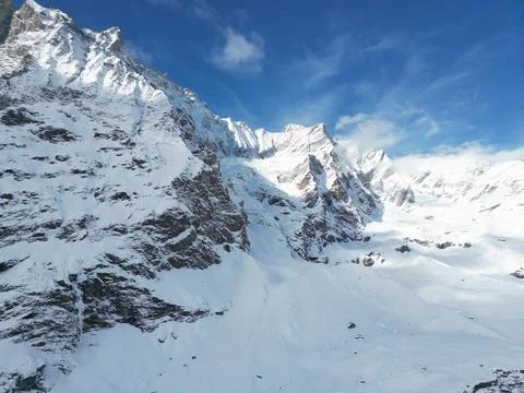 Sharp, Icy Peaks of a Mountain Range Stock Photos