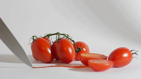 A sharp knife cuts chili tomatoes_4 Stock Footage