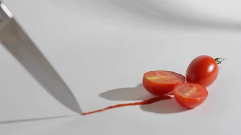 A sharp knife cuts chili tomatoes_6 Video stock 118454223