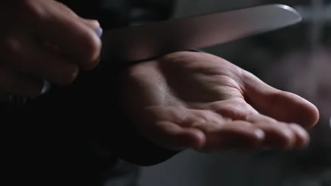 Sharp knife in the hands of a psychopath, close-up 库存影片 242363735