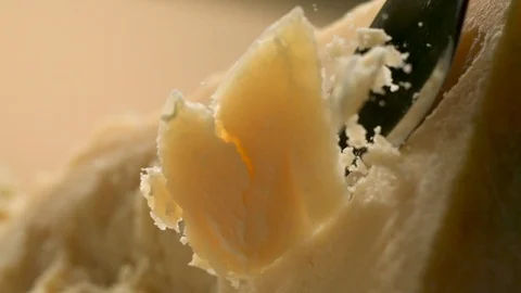 A sharp knife shreds hard cheese into small pieces. Stock Footage 83724305