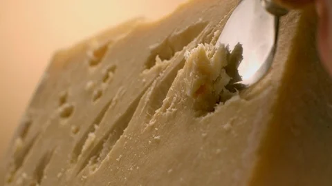 A sharp knife shreds hard cheese into small pieces. Stock Footage 83724525