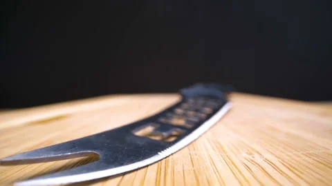 A sharp knife on top of the table in the kitchen Stock Footage 135702317