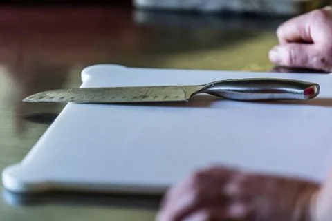 Sharp Knive with Black Handles Laying on Table Stockfoto's