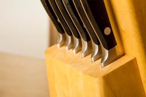 Sharp knives in their block Foto stock