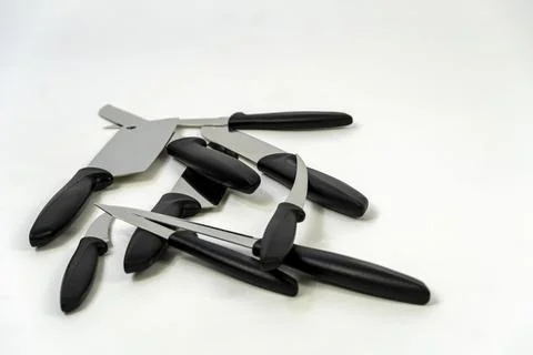 Sharp large kitchen knife on a dark surface, white background mexico Foto stock