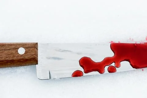 Sharp metal kitchen knife edge used as a violent murder weapon with blood dro Stock Photos