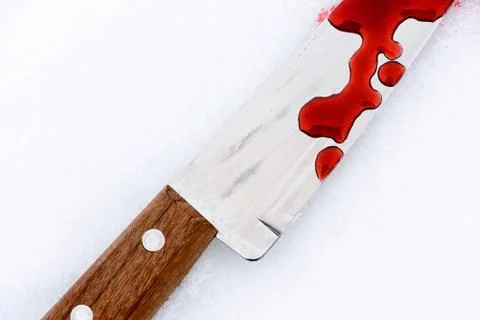 Sharp metal kitchen knife edge used as a violent murder weapon with blood dro Stock Photos