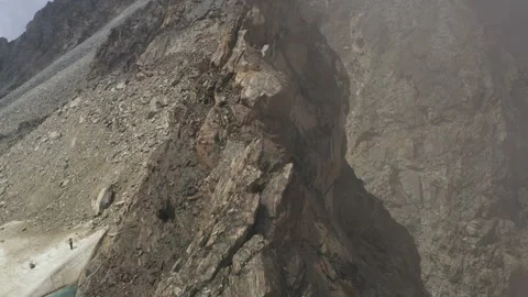 Sharp mountain range aerial view. Steep rocky ridge landscape Stock Footage 169745773