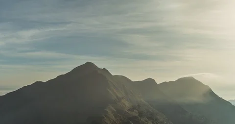 Sharp Mountain Ridge and Morning Mist (4K Time-lapse) Video stock 107917844