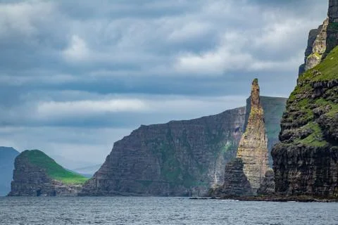 Sharp needle iconic rocks in Faroe Islands Stock Photos