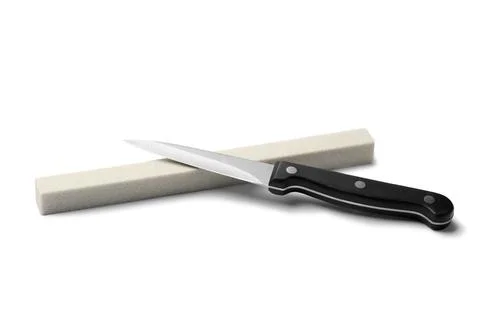 Sharp paring knife with grindstone isolated on white Stock Photos