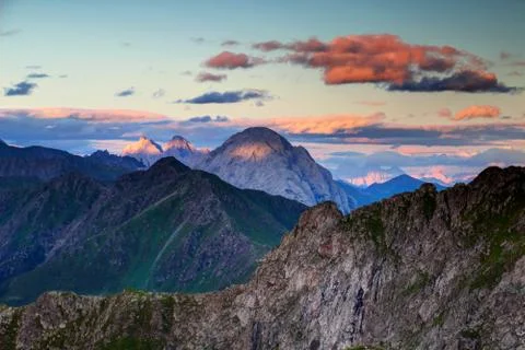 Sharp peaks at sunset in Carnic Alps main ridge and Julian Alps Stock Photos