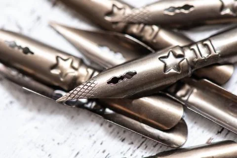 Sharp pen for calligraphy. close-up. retro style Stock Photos