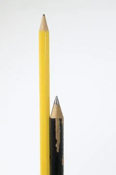 Sharp pencils large and short, black and yellow in Guatemala. Stockfoto's