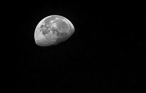 Sharp picture of the half moon in the dark sky Stock Photos