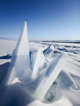 Sharp pieces of ice on the lake Stock Photos