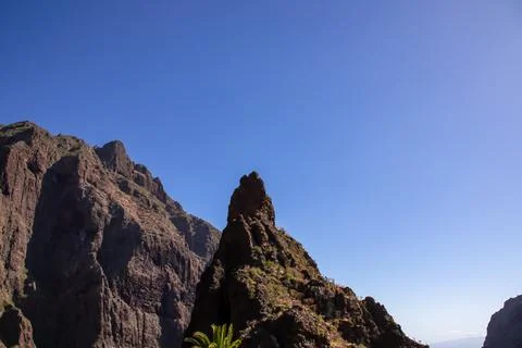 Sharp pinnacle in centre of remote tourist village Masca in the Teno mounta.. Stock Photos
