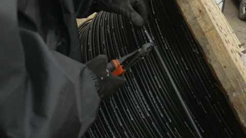 Sharp plier cuts an optical fiber cable. Stock Footage 126939525