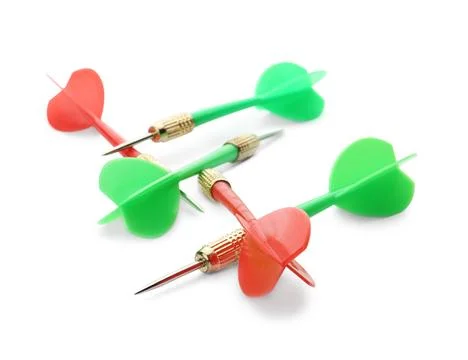 Sharp red and green darts isolated on white 写真素材