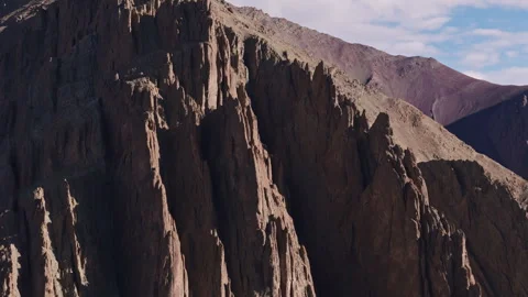 Sharp Ridges and Jagged Cliffs in Rugged Highlands Stock Footage 311042062