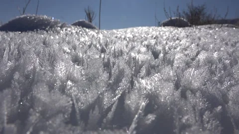 Sharp rime ice and hoar frost cover ground, delicate winter - Frosted Surface Stock Footage 339817981