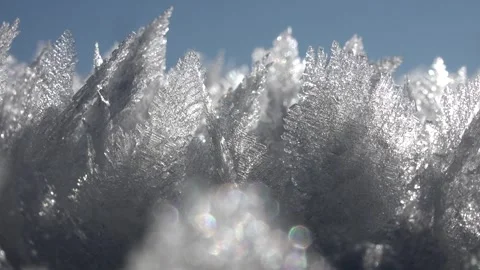 Sharp rime ice and hoar frost cover ground, leaving delicate winter crystals Stock Footage 339818021