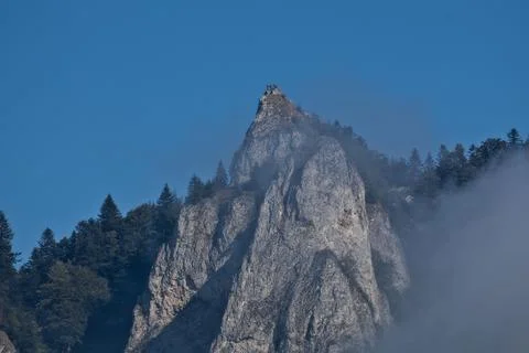 Sharp Rocky Summit Peak of Trzy Korony Mountain with Hikers Stock Photos