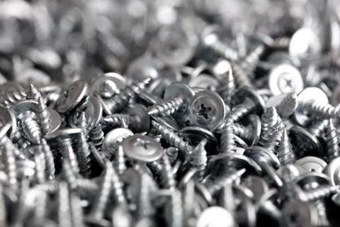 Sharp screws as abstract background Stock Photos