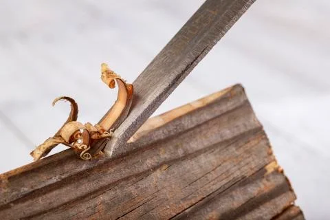 Sharp steel chisel for cutting wood. Accessories for carpenters in the worksh Stock Photos