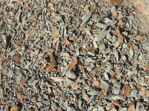 Sharp stone chips from a broken rock Stock Photos