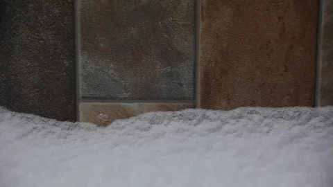 Sharp stone wall snow hd footage Stock Footage 100145205