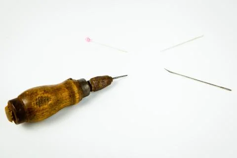 Sharp tailor's tools, spiky instrument for hand made tailoring in diagonal sh Stock Photos