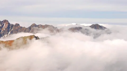 Sharp Tatra mountains summits over the clouds timelapse. Stock-Footage 39731942