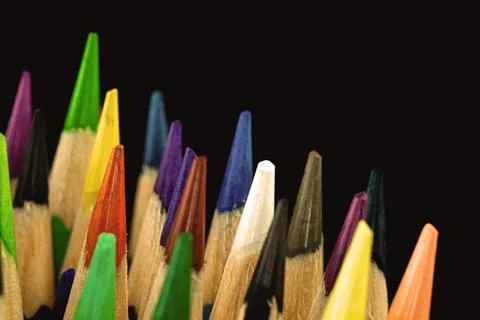 Sharp tips of the color pencils close-up and macro photography, black backgro Stock Photos