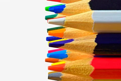 The sharp tips of the pencils. Bright colored pencils. Colored pencils on white Stockfoto's