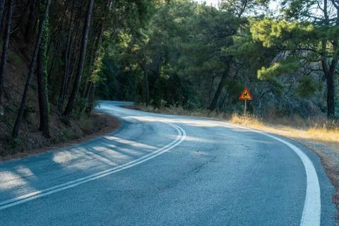 A sharp turn in the highlands. Stock Photos