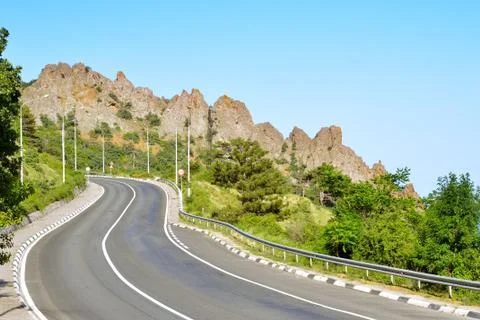 Sharp turn on the Mountain Highway. Stock Photos