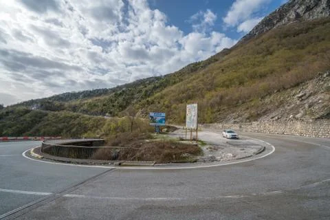 Sharp turn on a mountain road Stock Photos