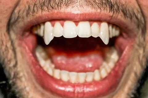 Sharp vampire teeth Stock Photos
