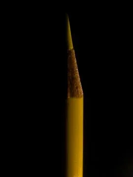 Sharp yellow pencil in the dark 库存照片